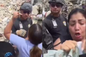 Policiais são flagrados roubando dinheiro de escombros na Venezuela. Veja vídeo